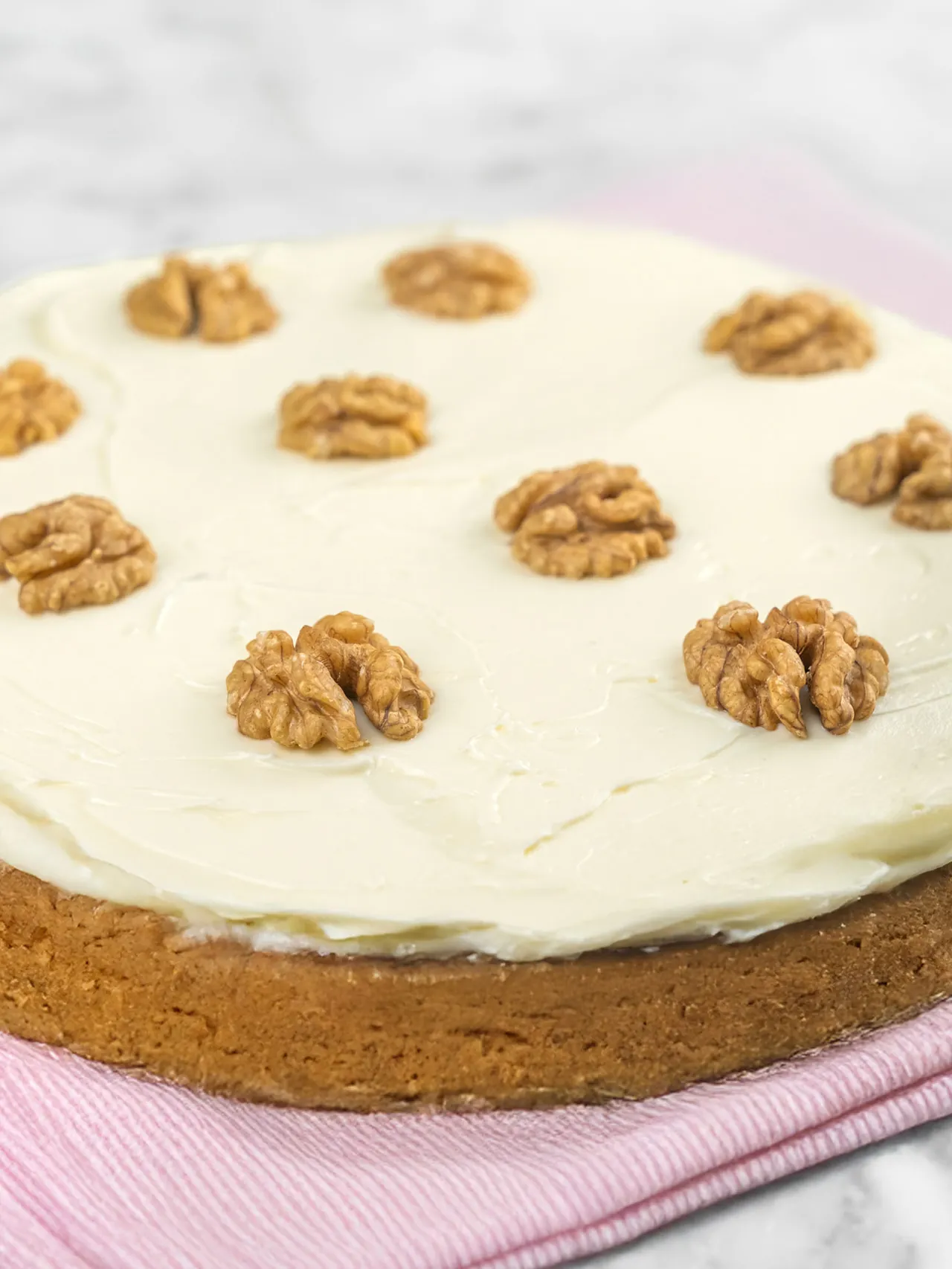 Carrot walnut cake on a cozy table